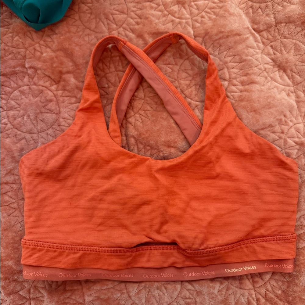 Outdoor Voices Cross-Back Sports Bra in Vibrant Orange